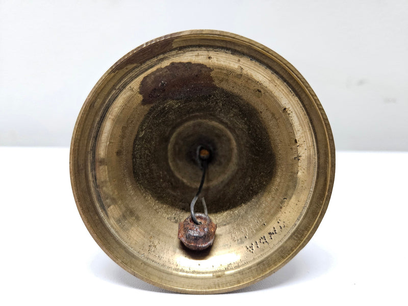 Vintage brass bell with engraved lines and markings on the insde. Please see photos as they form part of the description. In good original condition.