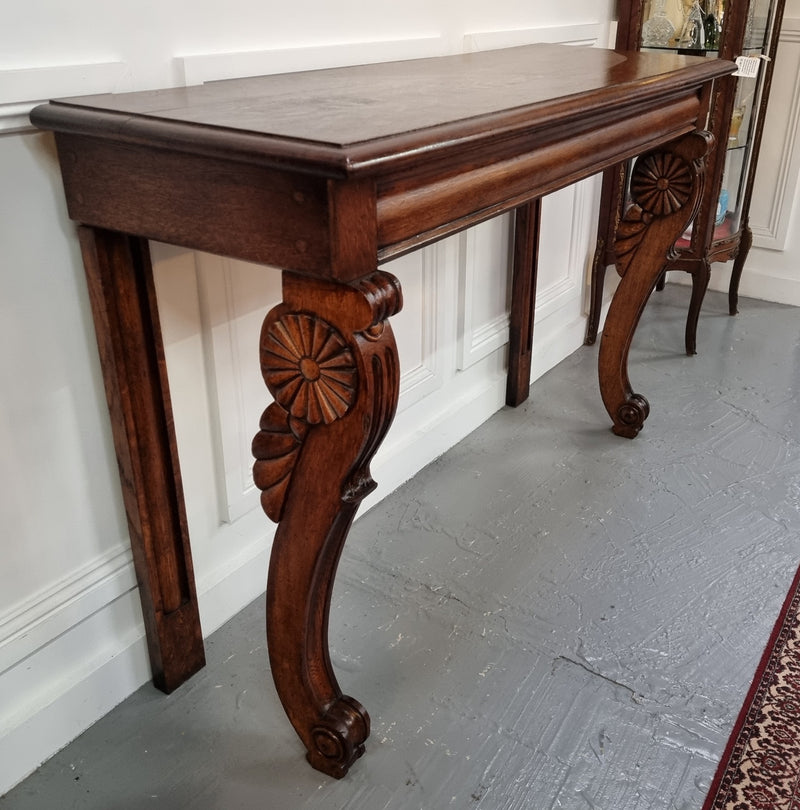 Beautiful 19th Century French Oak console table of great narrow proportions. It has been sourced from France and it is good original detailed condition.