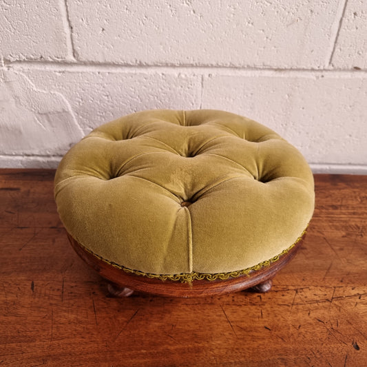 Vintage round upholstered buttoned footstool. Sourced locally and is in good original condition, please view photos as they help for part of the description.