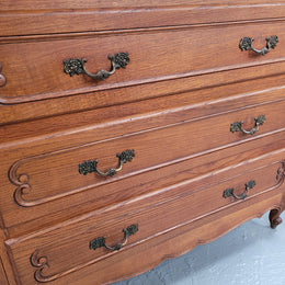 French Louis 15th style Oak three drawer chest of drawers with wooden top. It has been sourced from France and is in good original detailed condition.