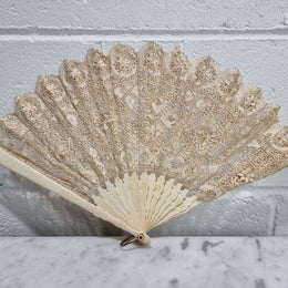 Beautiful Edwardian bone and lace hand held fan. In good original condition, please view photos as they help form part of the description.