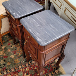 Pair of Walnut Louis XV style grey marble top bedside cabinets. Single drawer, one cupboard and lovely French cabriole legs. They have been sourced from France and are in good original condition.