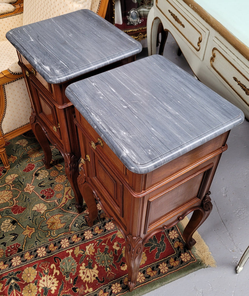 Pair of Walnut Louis XV style grey marble top bedside cabinets. Single drawer, one cupboard and lovely French cabriole legs. They have been sourced from France and are in good original condition.