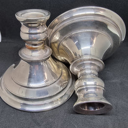 Beautiful pair of silver plate Walker and Hall candle Holders which are nice and heavy and in good condition.
