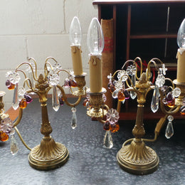 A stunning pair of French Bronze gilt Girandole candelabras, with lovely quartz drops. They are 36 cm tall and have been rewired to Australian standards. They are in very good original condition.
