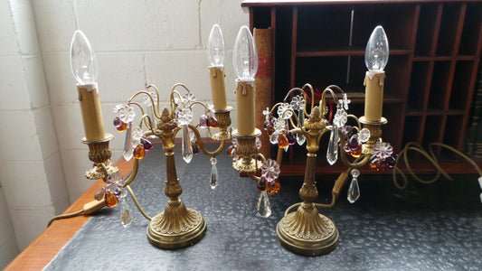A stunning pair of French Bronze gilt Girandole candelabras, with lovely quartz drops. They are 36 cm tall and have been rewired to Australian standards. They are in very good original condition.
