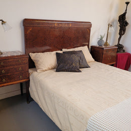 French Art Deco bedroom suite consisting of queen size bed in Amboyna wood and featuring pretty inlay. It comes with a matching pair of bedsides. It is a very stylish and high quality suite. It has been sourced from France and is in good original detailed condition.