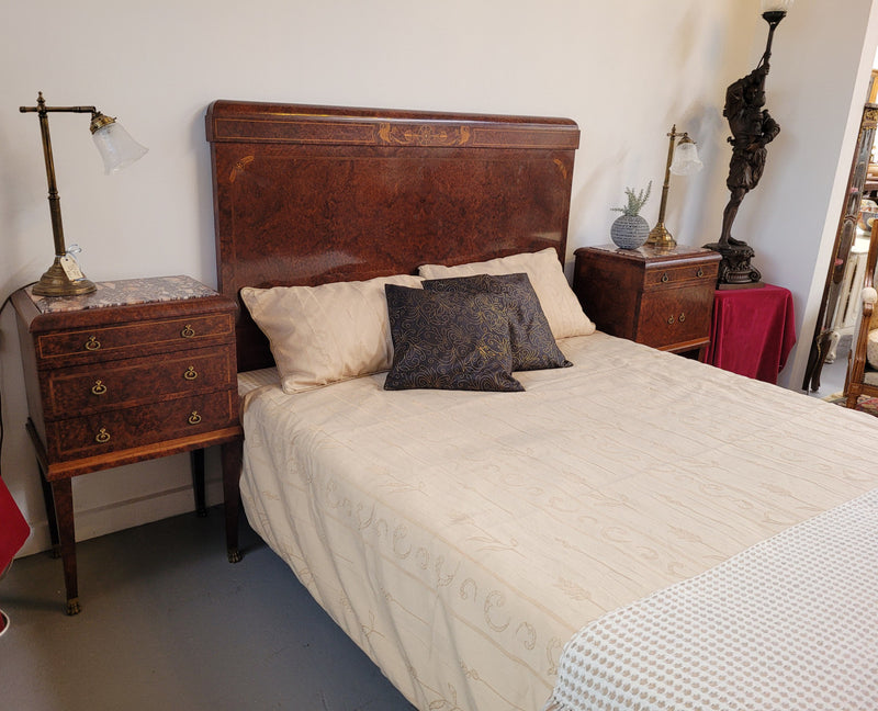 French Art Deco bedroom suite consisting of queen size bed in Amboyna wood and featuring pretty inlay. It comes with a matching pair of bedsides. It is a very stylish and high quality suite. It has been sourced from France and is in good original detailed condition.