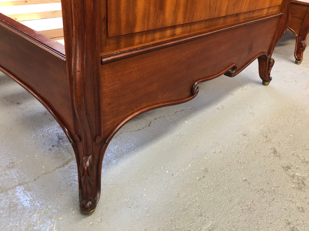 Rare French king single walnut bed, circa 1900. In good original condition. We currently have two matching kind single beds but they are being sold separately.