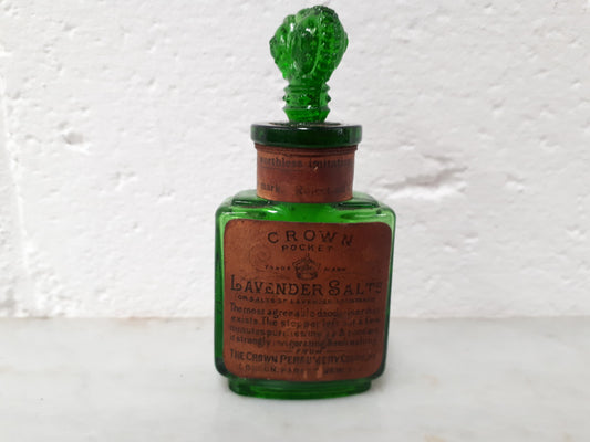 Victorian green glass Crown perfume bottle. In good original condition.