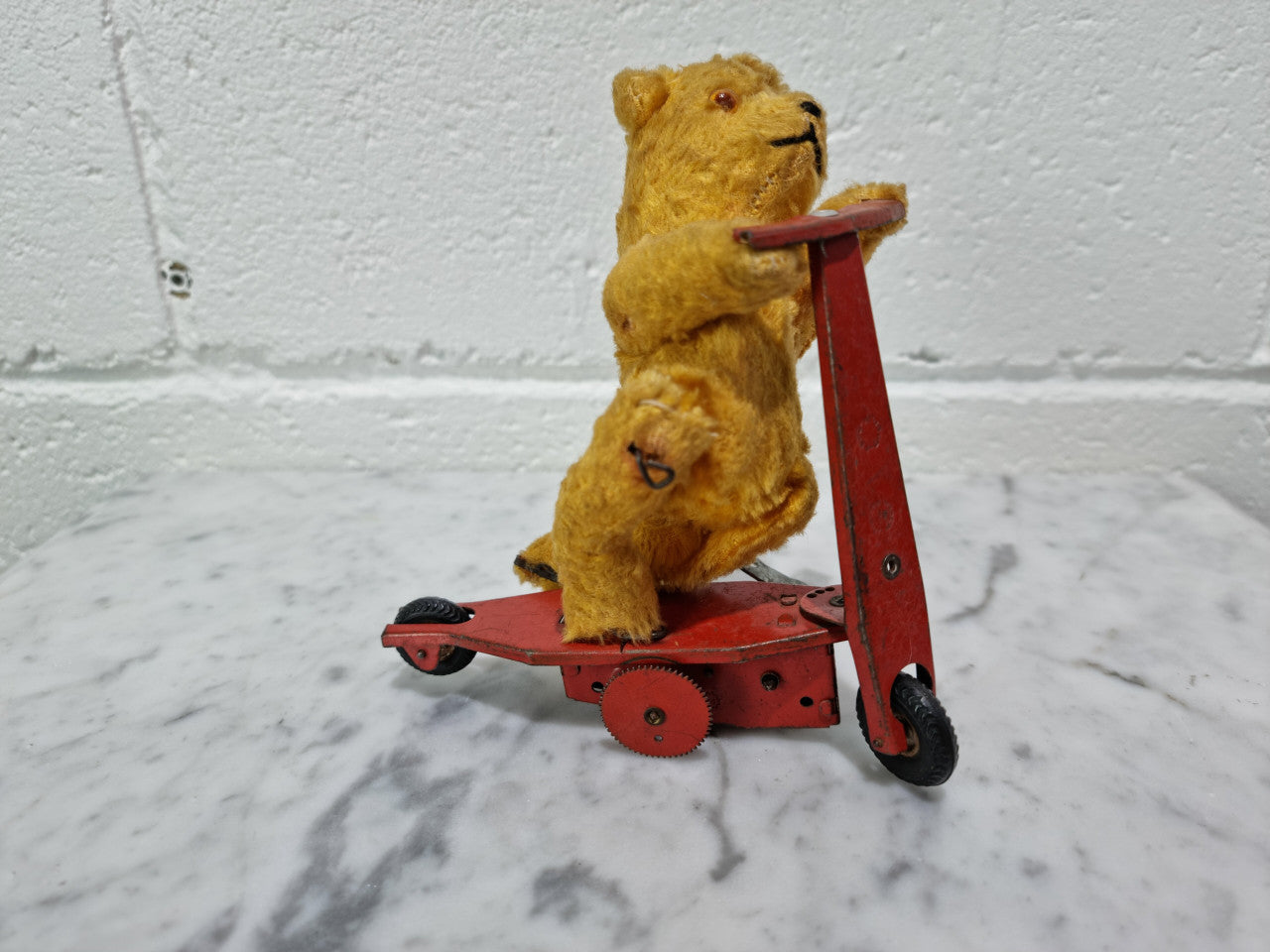 "Gebruder Fendi" Bear Riding Scooter Wind up Toy