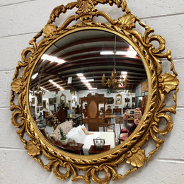 Lovely French round, gilt floral convex mirror. Mirror has lovely detail and in good condition.

Mirror diameter is 49 cm.