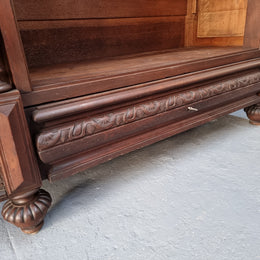 Henry II style 19th century walnut open bookcase with drawer which was originally an armoire now converted to a bookcase. It comes with four adjustable shelves. Is in good detailed condition.