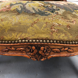 Pair of French Walnut Tapestry covered armchairs. They are in good original detailed condition. Slight wear and tear to fabric but still in good condition please view photos.