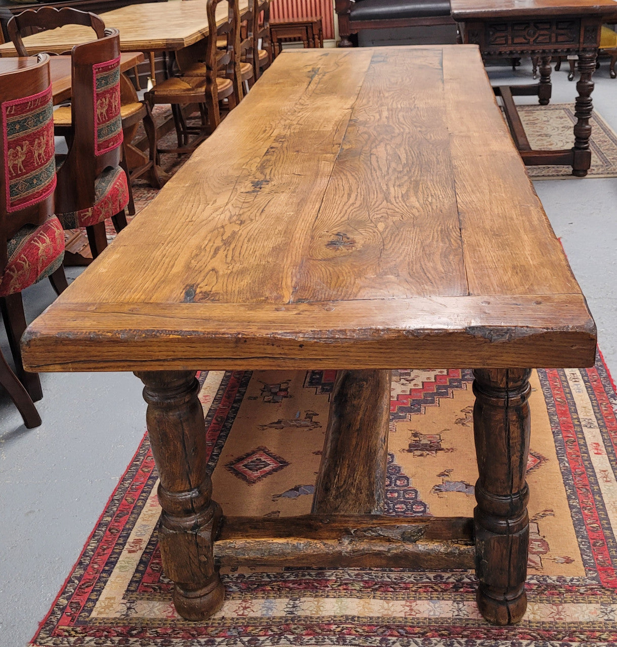 Large impressive 19th century 2.5 meter Antique French Oak farmhouse table. Loads of character with a stunning solid thick top and has a long drawer at one end. Sourced from France and in good original detailed condition.