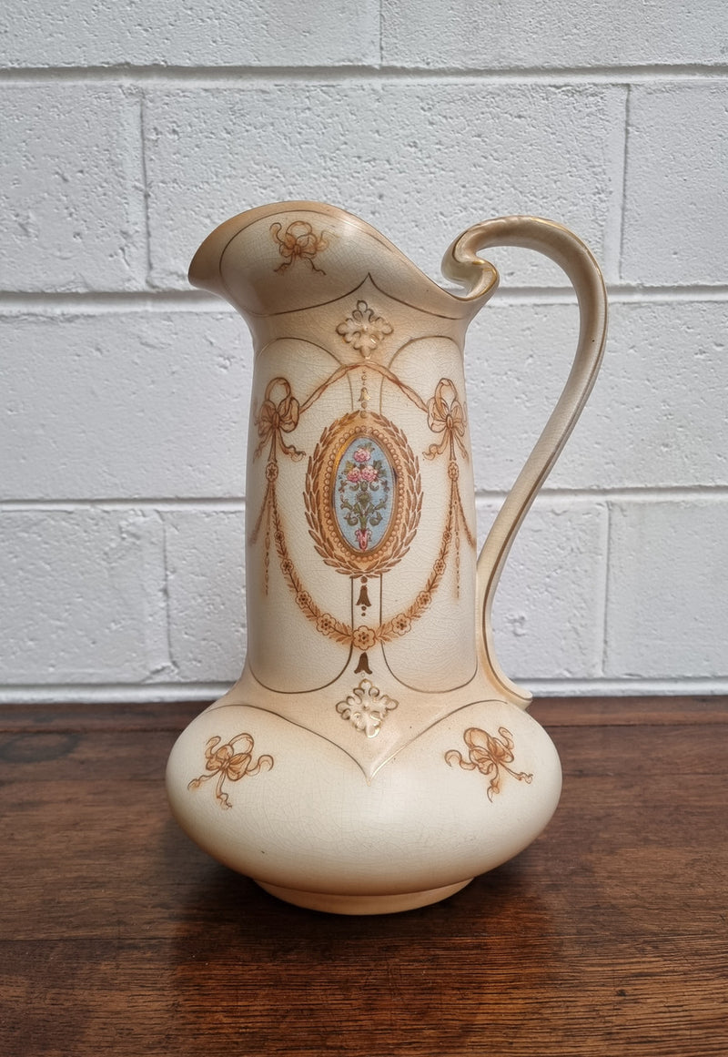 Charming large Crown Devon jug and basin set. Muted colors featuring garlands and floral medallions “Festoon Pattern” No chips or cracks in good condition commensurate with age