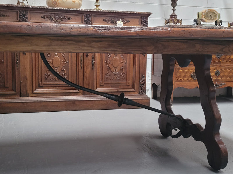 Hard to find three meter Spanish style dining table with a width of 108 cm. Made from reclaimed elm and Oregon with nice iron work. Can easily sit 10-12 people and is in good original detailed condition.