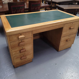 Parliament house desk made from Queensland maple. Desk has room numbers stamped to front. It's in good original condition. Purchased from a sale in old Parliament House in the late 1980's.