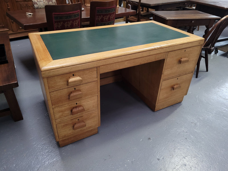 Parliament house desk made from Queensland maple. Desk has room numbers stamped to front. It's in good original condition. Purchased from a sale in old Parliament House in the late 1980's.