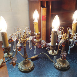 A stunning pair of French Bronze gilt Girandole candelabras, with lovely quartz drops. They are 36 cm tall and have been rewired to Australian standards. They are in very good original condition.