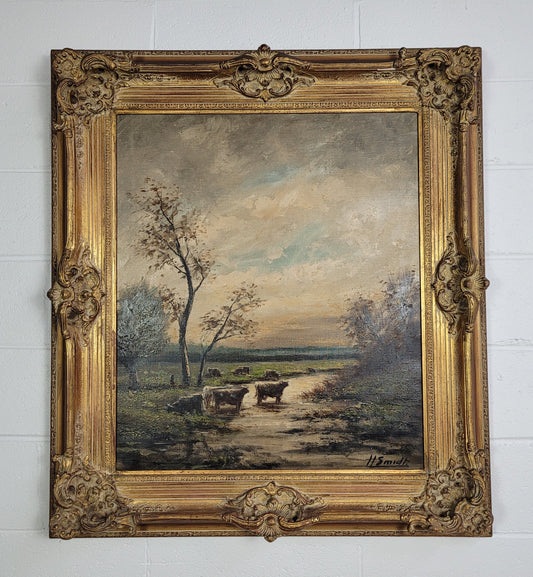 A stunning painting sourced in France signed oil on canvas of "Cows In River Landscape". Framed in a magnificent gilt frame and is in good original detailed condition.