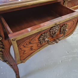 Beautifully fully restored French Antique Rosewood partners desk with beautiful ormolu detail and lovely tooled new leather top. There are three functioning drawers on one side for all your storage needs.
