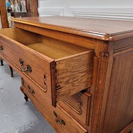 French Louis 15th style Oak three drawer chest of drawers with wooden top. It has been sourced from France and is in good original detailed condition.
