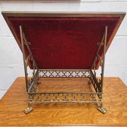 Antique French brass Gothic Revival book stand with red velvet. It has sourced from France and is in good original condition.