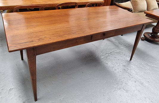 Antique French Oak Farmhouse table in fully restored condition. Features a single drawer and tapered legs.