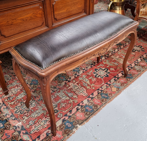 Impressive French Louis 15th style walnut upholstered duet leather stool. Very Good Condition.  Circa: 1930’s, sourced in France.