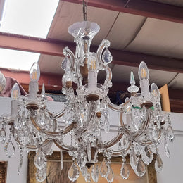 Sourced From France an attractive eight arm French crystal chandelier. It has been fully rewired to Australian standards and is in good original working condition.