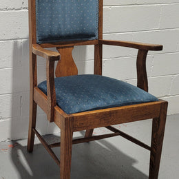 Arts and crafts style blue upholstered armchair. In good original detailed condition.