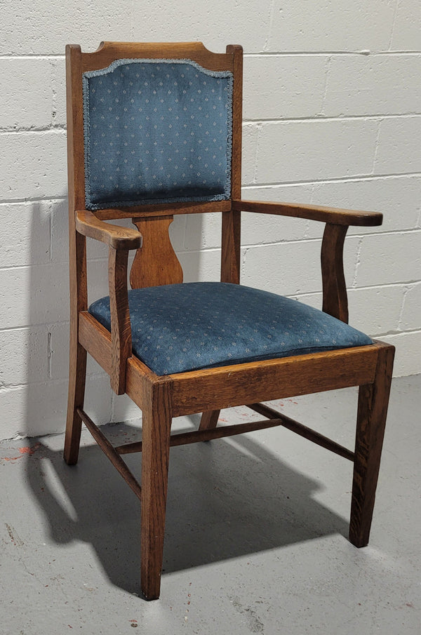 Arts and crafts style blue upholstered armchair. In good original detailed condition.