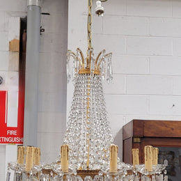 Fine French Empire basket shaped crystal chandelier. Consisting of ten exterior arms and four interior lights. It has stunning crystal's with prism drops. It has been sourced from France fully rewired to Australian standards.