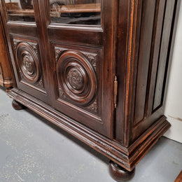 Substantial French Henry 2nd Walnut two door bookcase. It has five fully adjustable shelves and has been sourced from France. It is in good original detailed condition.