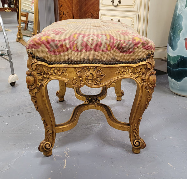 Charming 19th Century gilt wood tapestry covered Louis XV style stool. It has a beautifully carved base and undercarriage and it has been sourced from France. It is in good original detailed condition, please view photos of tapestry has they help form part of the description.