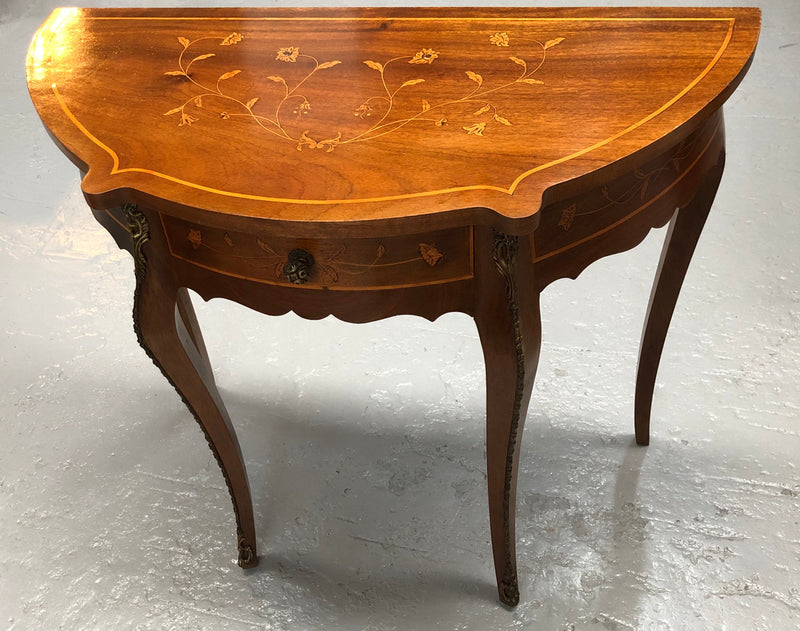 Stunning small inlaid French Walnut Louis XV style hall table with ormolu mounts and beautiful details. It has been sourced from France and is in good orignal detailed condition.