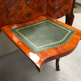 French Mahogany hidden dressing table with beautiful marquetry inlay. In good restored condition. Circa: 1950's