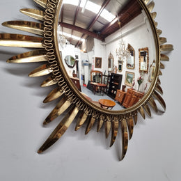 Stunning Vintage starburst convex mirror. It has been sourced from France and in good original detailed condition.