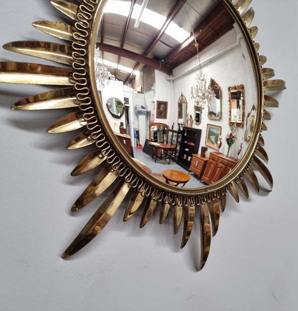 Stunning Vintage starburst convex mirror. It has been sourced from France and in good original detailed condition.