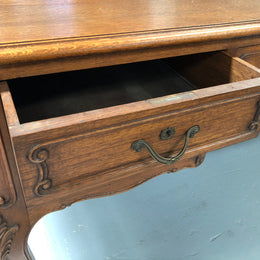 French Oak Louis XV style full partners desk with both sides having five functional drawers. In very good original detailed condition.
