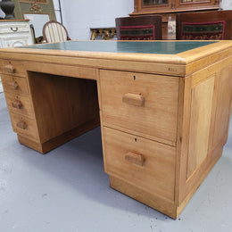 Parliament house desk made from Queensland maple. Desk has room numbers stamped to front. It's in good original condition. Purchased from a sale in old Parliament House in the late 1980's.