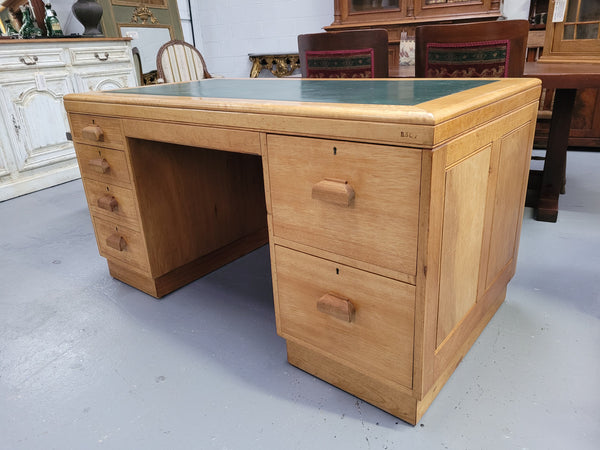 Parliament house desk made from Queensland maple. Desk has room numbers stamped to front. It's in good original condition. Purchased from a sale in old Parliament House in the late 1980's.