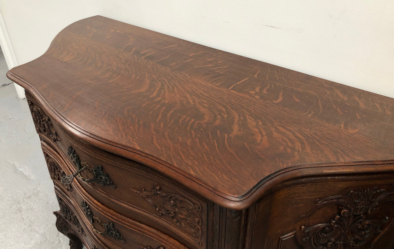 French Louis XV style dark Oak carved, two door and three drawer Commode /side cabinet. Could also be used as a TV cabinet or in the bedroom as storage very versatile. In good original detailed condition.