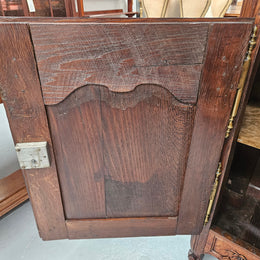 Louis 15th style oak 19th century cabinet with lovely brass hinges, handles & charming carving.  Circ: 1860's. In good original condition.