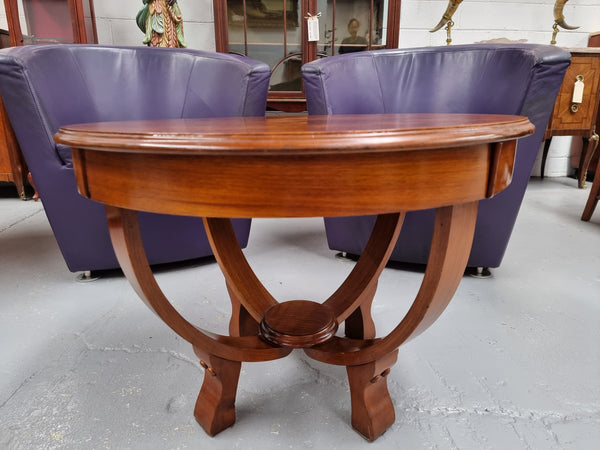 Art Deco figured Walnut round occasional table. It is in good original detailed condition and has been sourced locally.