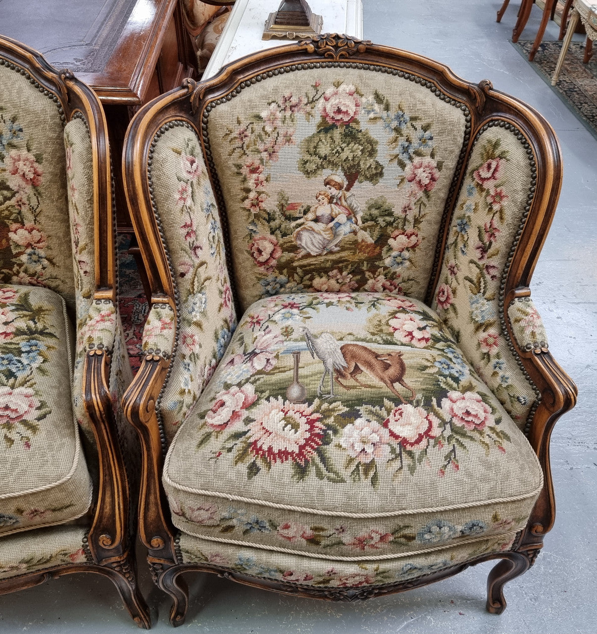 Pair of amazing French Walnut tapestry covered armchairs. The tapestry is in very good condition, please view photos as they form part of the description. Sourced from France and is in good original detailed condition.