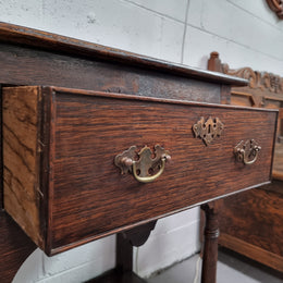Antique 19th Century English dark Oak three drawer Dresser with brass handles and in good original condition.