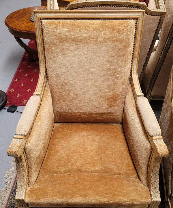 Pair of Louis XVI style painted arm chairs with carving & fluted legs. They have been sourced from France and the fabric is in good used original condition. Please view photos as they help form part of the description.