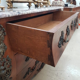 A Grand French Louis XV Style Flame Mahogany Commode